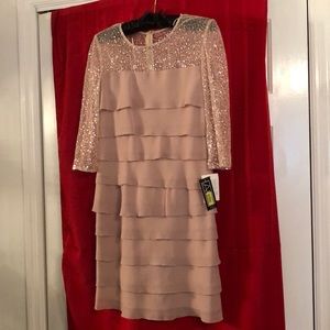 New with tags. Sequins on bodice.